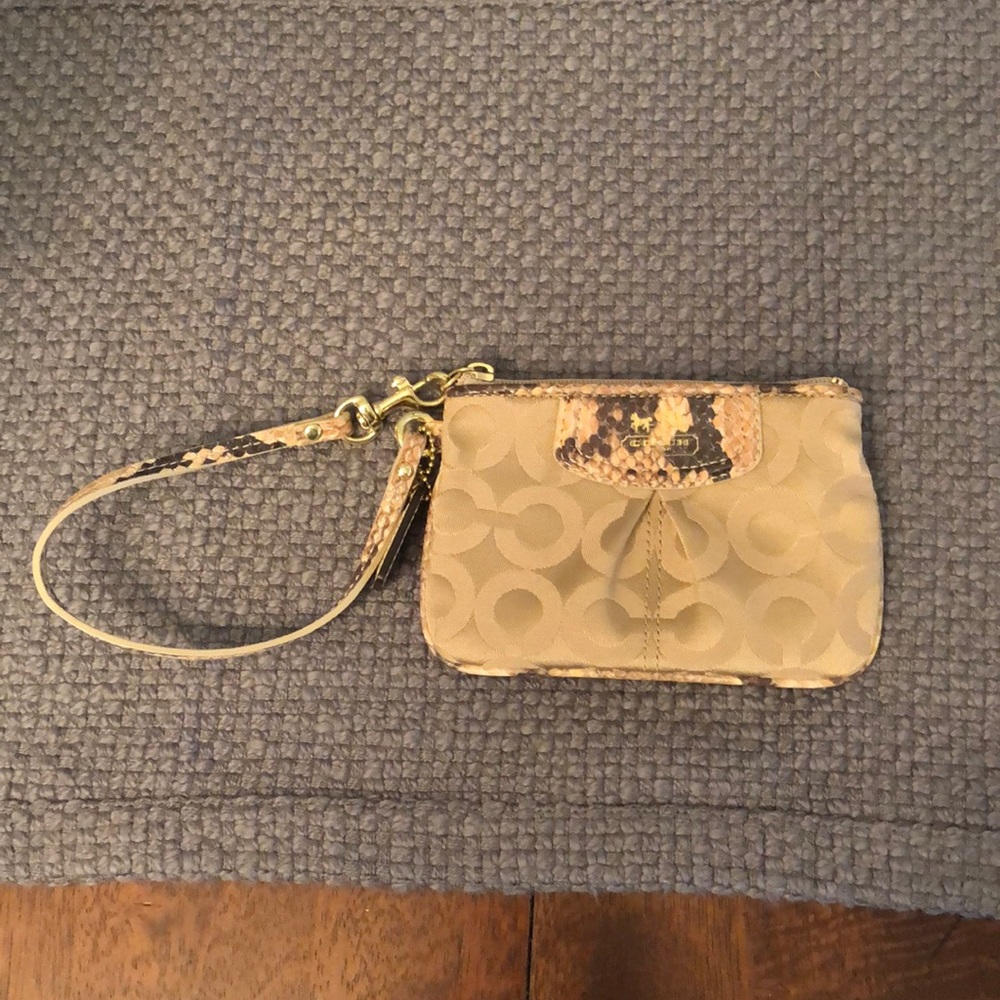 Never used small coach wristlet.